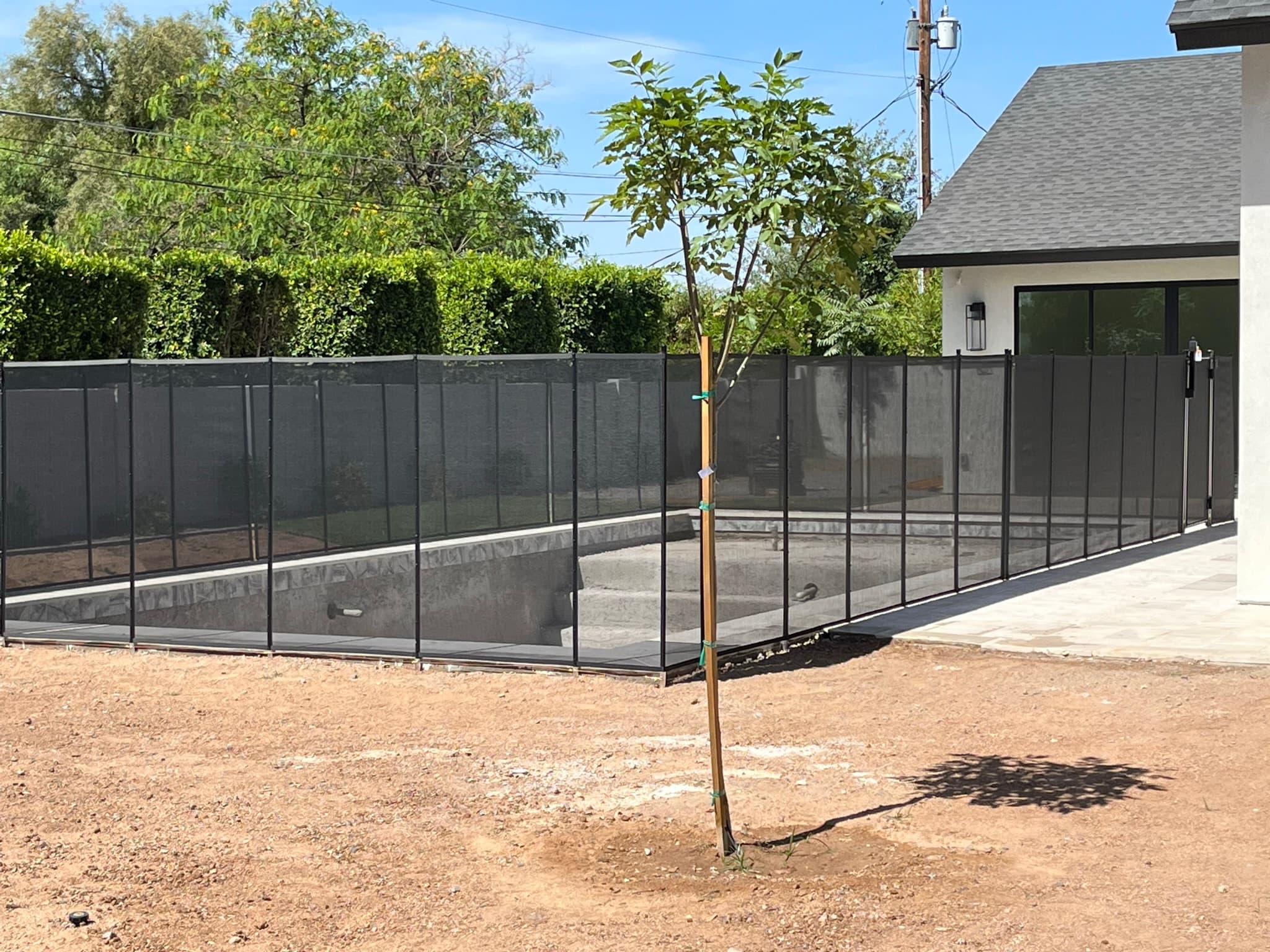 Pool fence corner fitting detail — removable mesh fence, Arizona